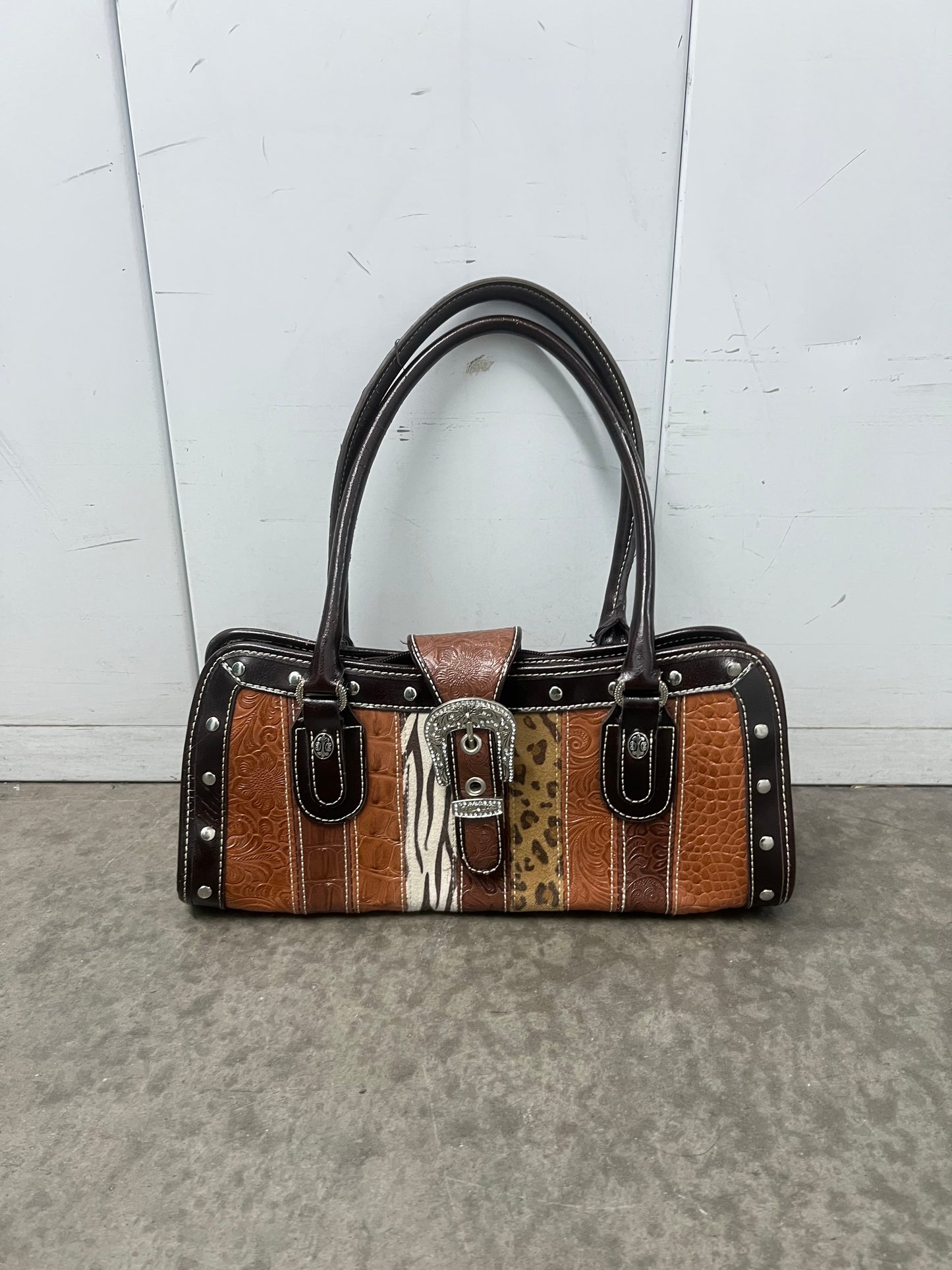 Vintage buckled animal print bag