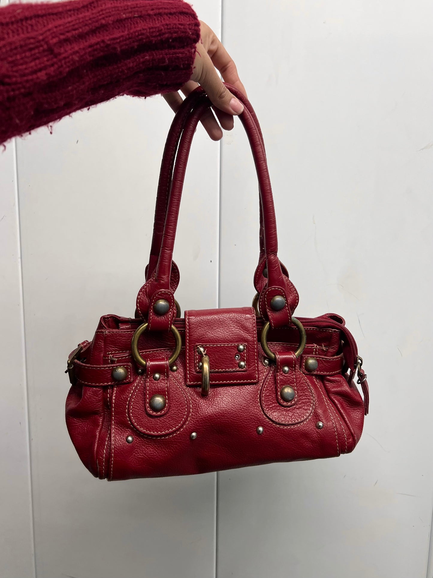 Vintage red buckled bag