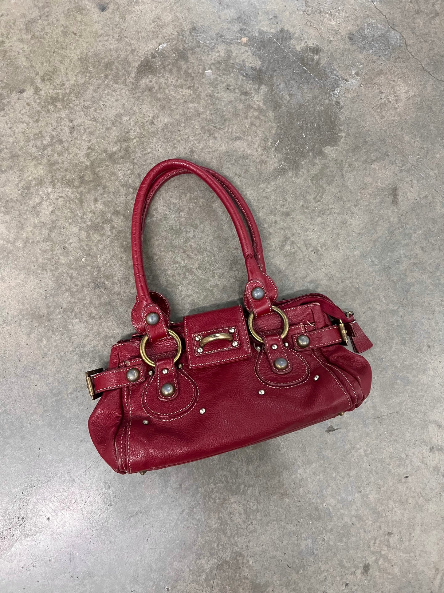 Vintage red buckled bag