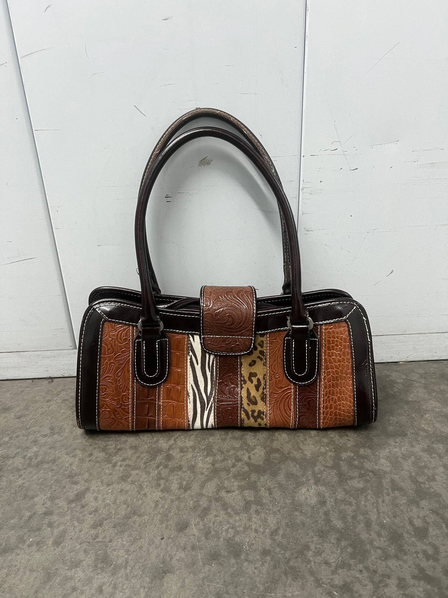 Vintage buckled animal print bag