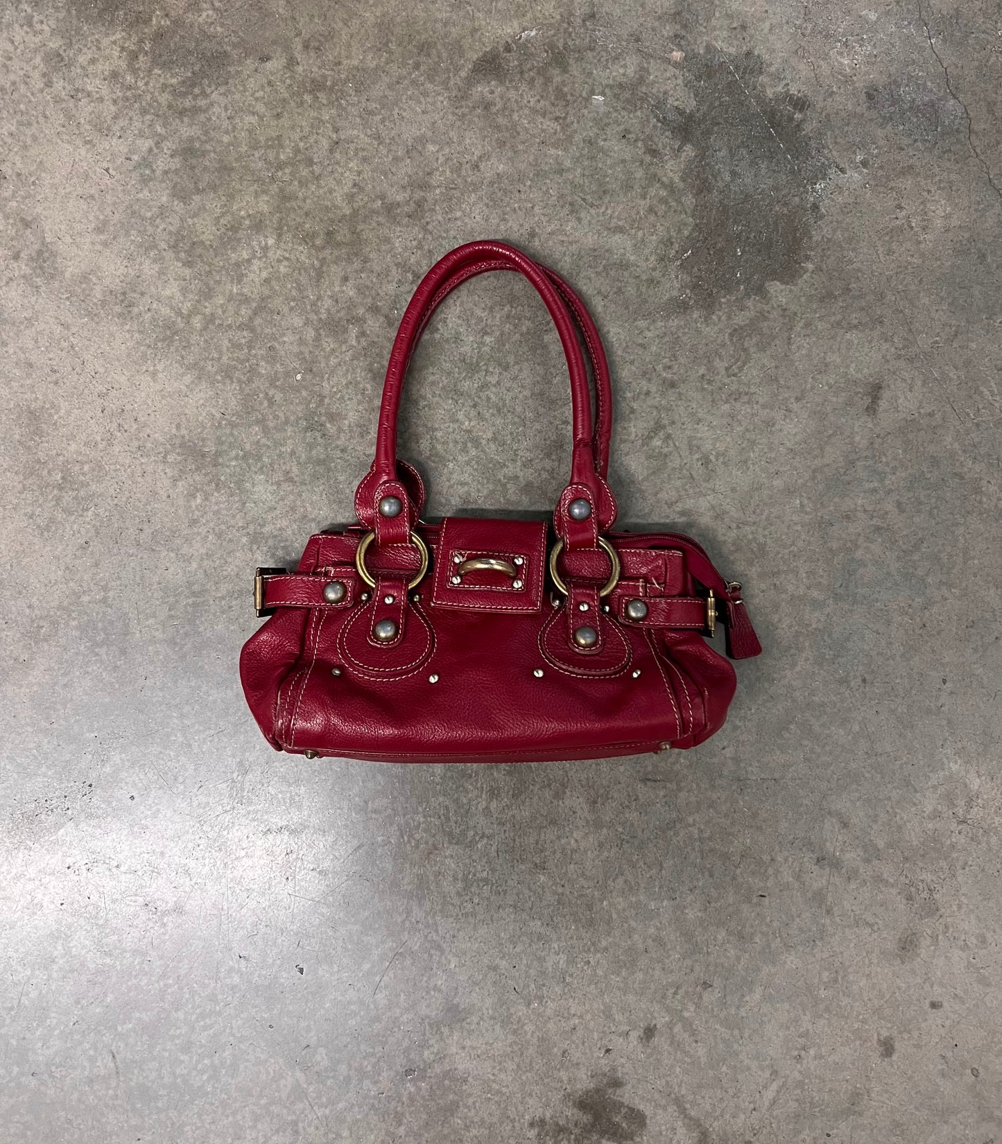 Vintage red buckled bag