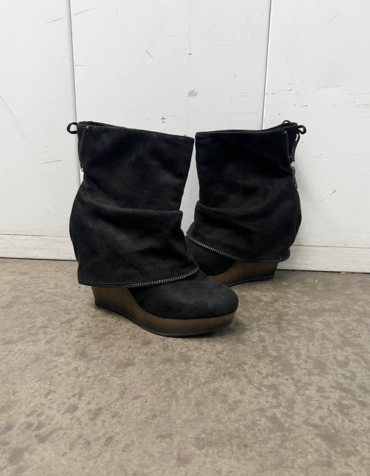 Vintage wooden boots