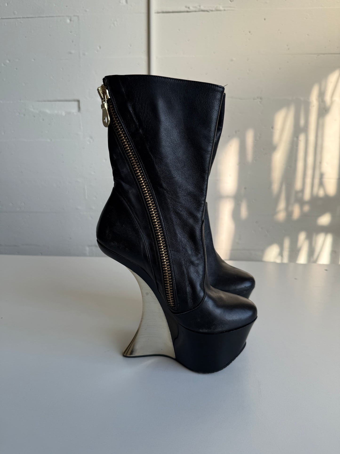 Vintage black leather platform boots